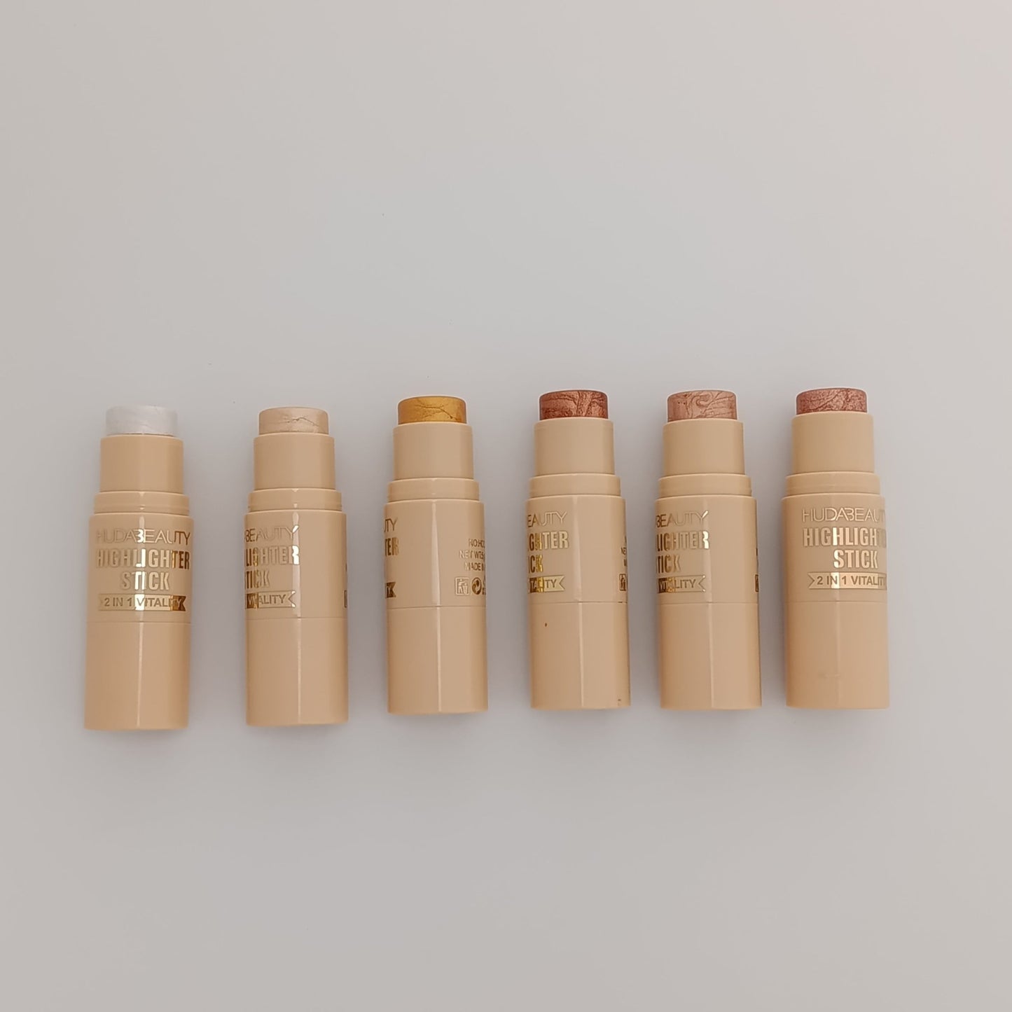 Huda Beauty Highlighter Stick – 2 - in - 1 Vitality Glow | Multi - Shade Collection (01–06) - Lotshop.pk