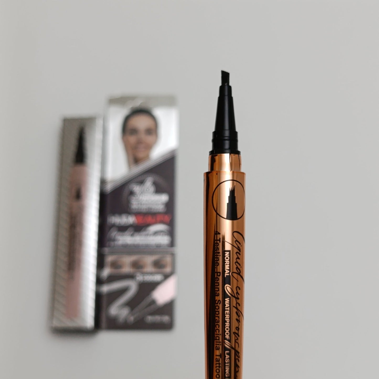 Huda Beauty Liquid Eyebrow Pen – 36H Waterproof, Tattoo Effect & Natural Finish - Lotshop.pk