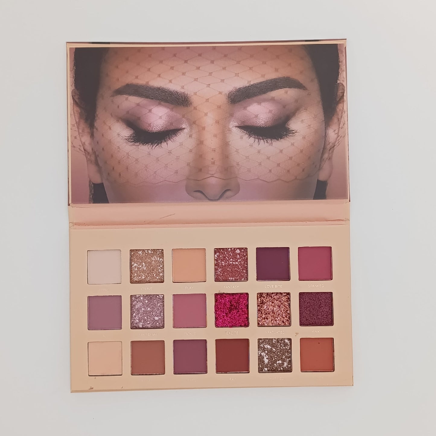Huda Beauty New NUDE Eyeshadow Palette – 18 Shades of Mattes, Shimmers & Glitters - Lotshop.pk