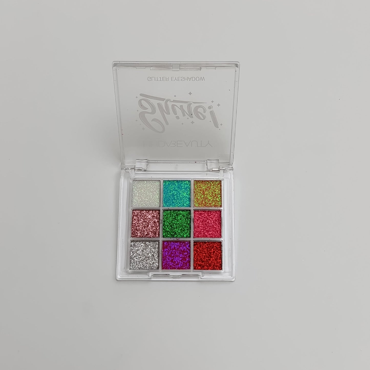 Huda Beauty Shine! 9 - Color Glitter Eyeshadow Palette – Ultra Pigmented, Long - Lasting & Sparkling Shades - Lotshop.pk