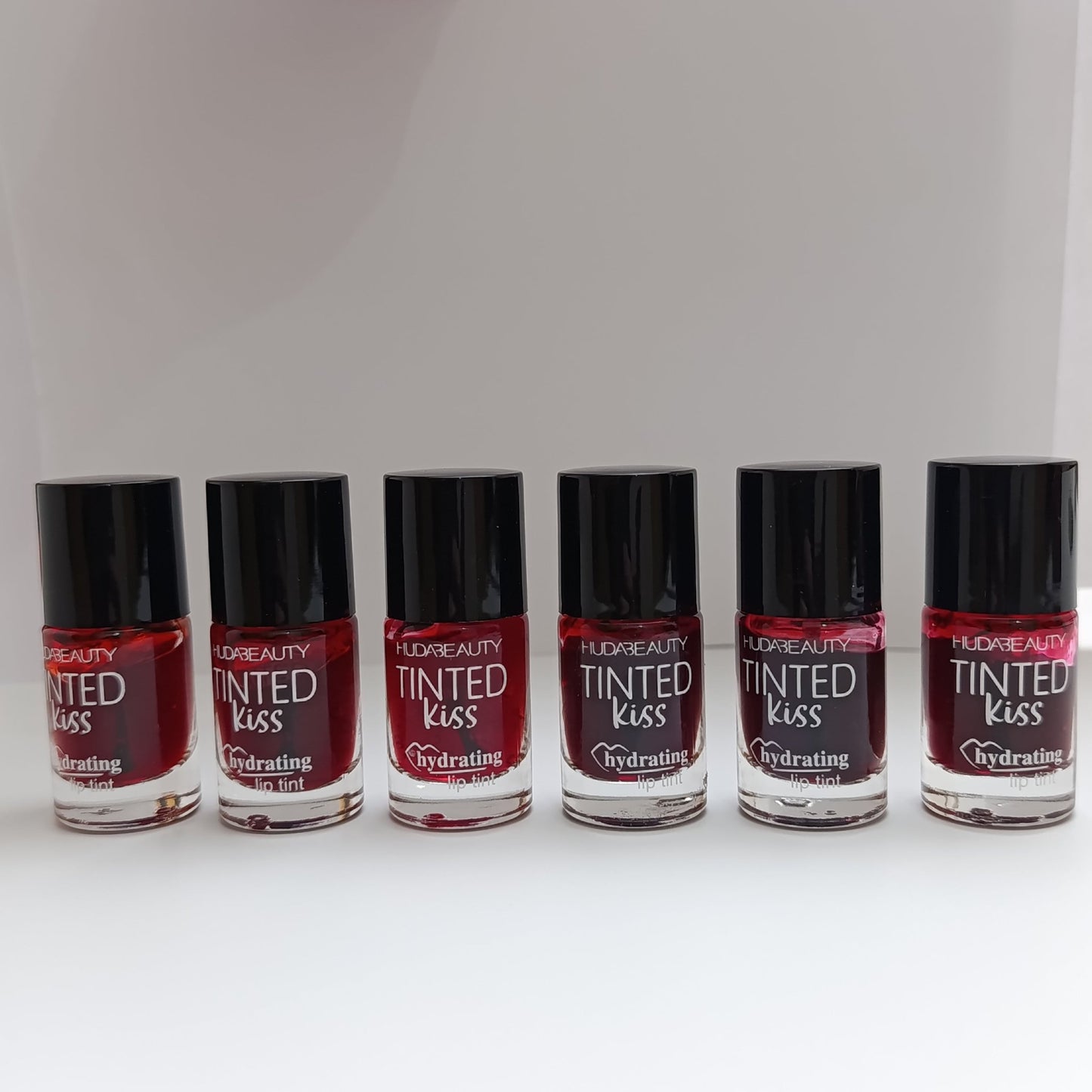 Huda Beauty Tinted Kiss Hydrating Lip Tint – 6 Shades | Long - Lasting, Waterproof & Smudge - Proof - Lotshop.pk
