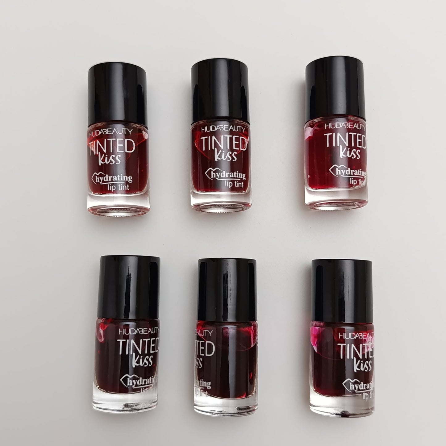 Huda Beauty Tinted Kiss Hydrating Lip Tint – 6 Shades | Long - Lasting, Waterproof & Smudge - Proof - Lotshop.pk