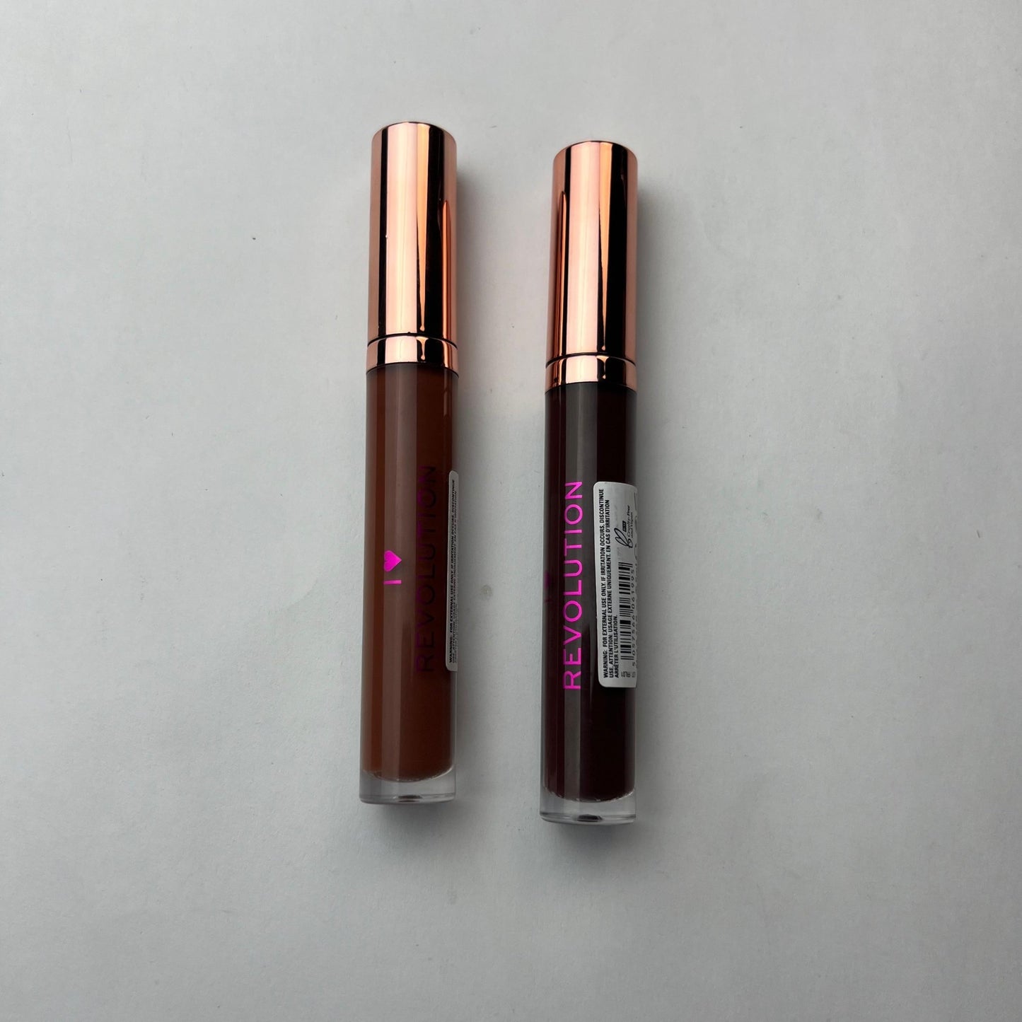 Pack of 2 Revolution Lip Glosses – Double the Shine, Double the Glamour - Lotshop.pk