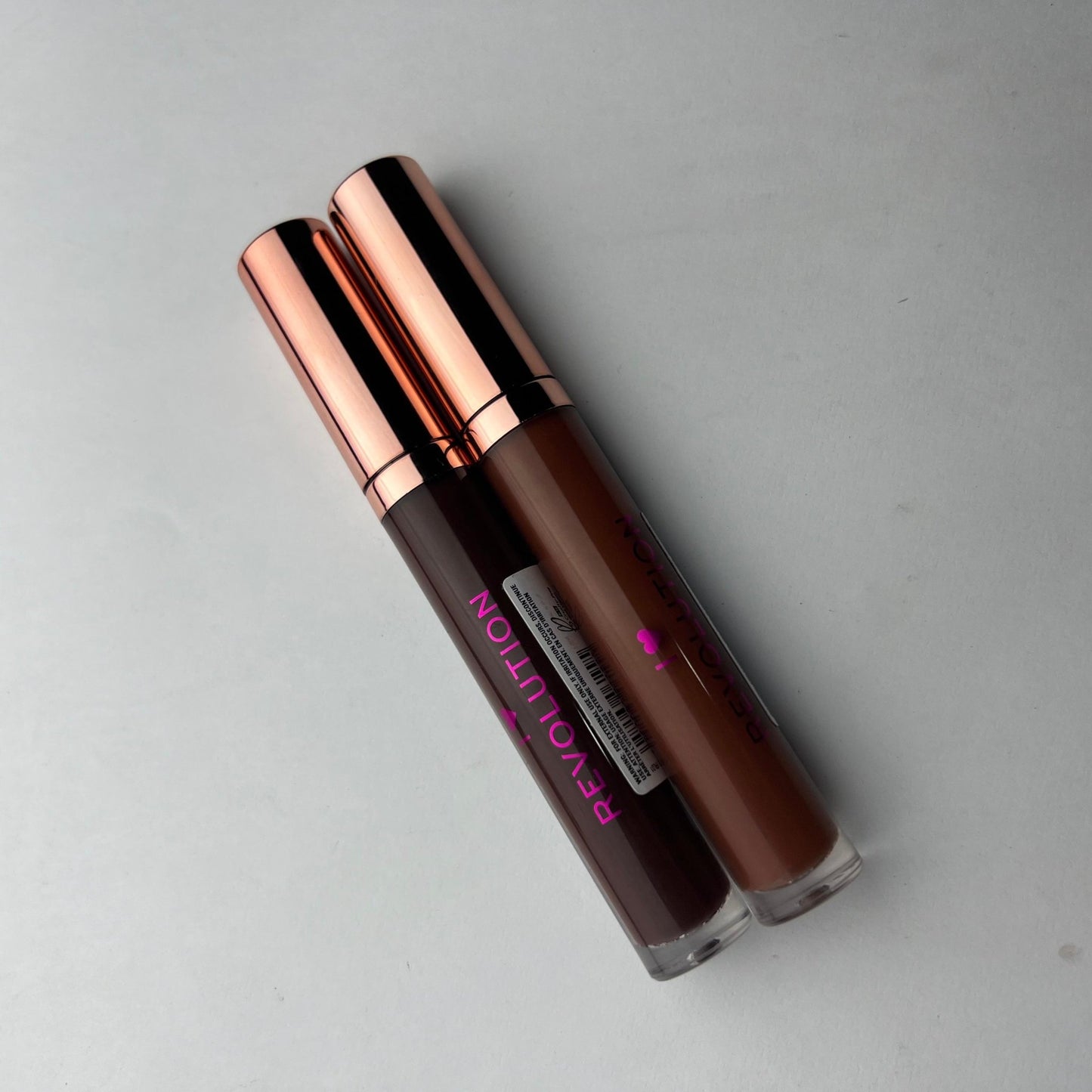 Pack of 2 Revolution Lip Glosses – Double the Shine, Double the Glamour - Lotshop.pk