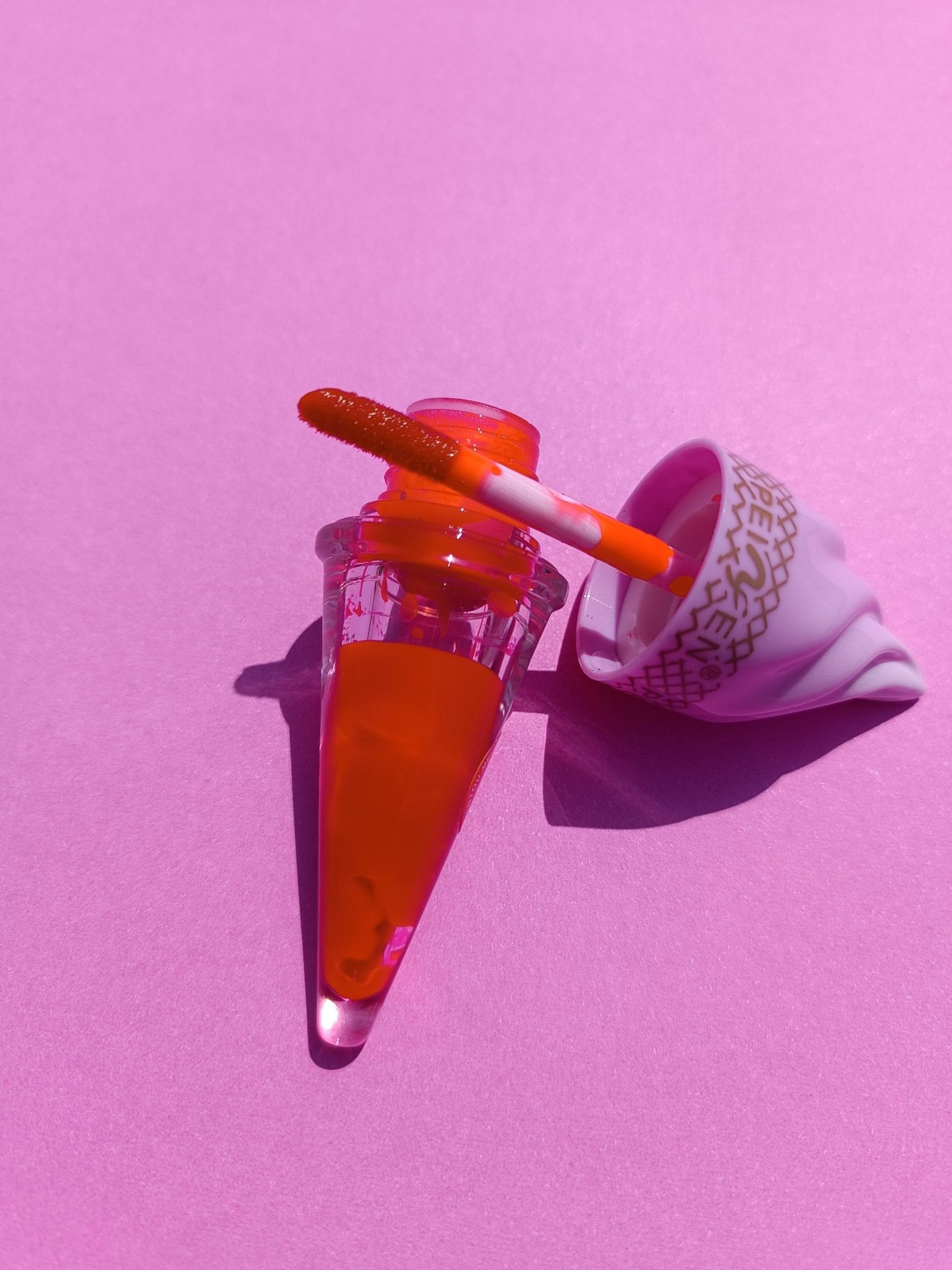 Peinyen tasty gelata lipgloss Available at Lotshop.pk
