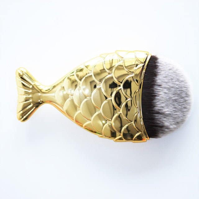 Fish-shaped Mermaid foundation applying makeup brush