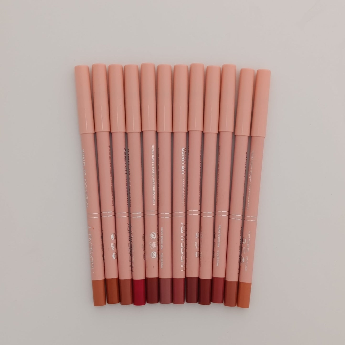 Huda Beauty 12 - Color Lip Liner Set – Waterproof, Long - Lasting & Highly Pigmented 🎨💄 - Lotshop.pk