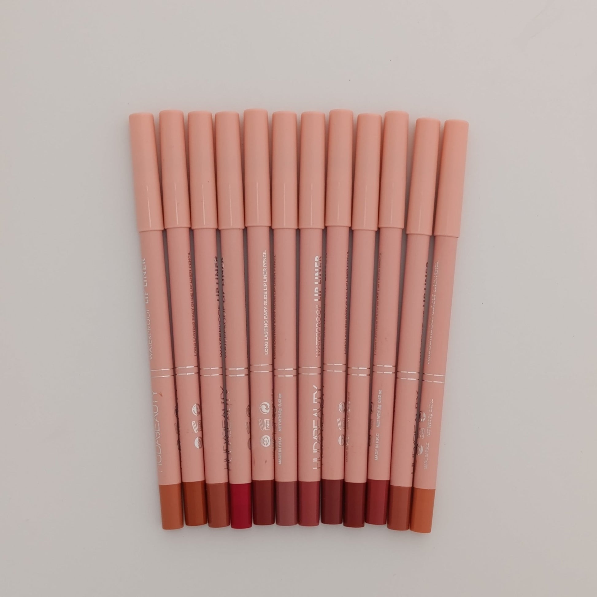 Huda Beauty 12 - Color Lip Liner Set – Waterproof, Long - Lasting & Highly Pigmented 🎨💄 - Lotshop.pk