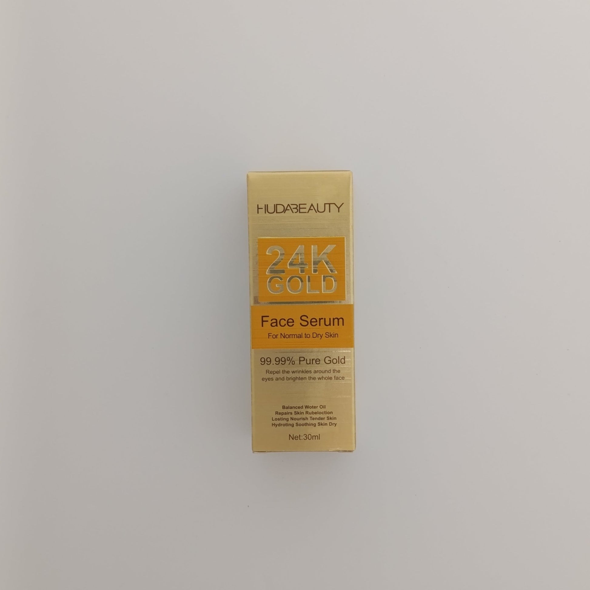 Huda Beauty 24K Gold Face Serum – Pure Gold Anti - Aging & Brightening Serum (30ml) - Lotshop.pk