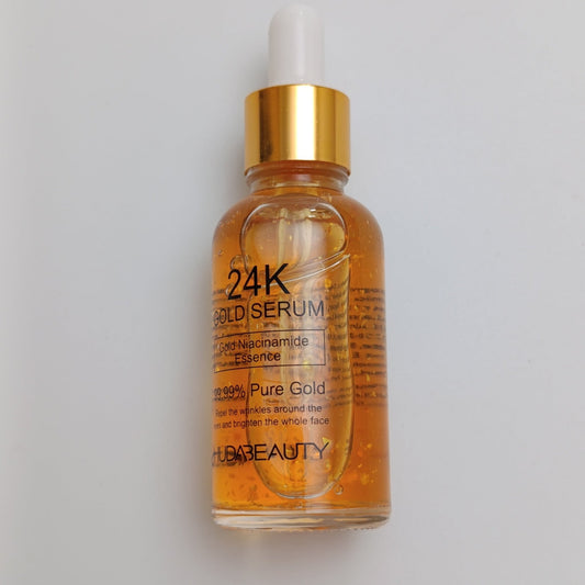 Huda Beauty 24K Gold Face Serum – Pure Gold Anti - Aging & Brightening Serum (30ml) - Lotshop.pk