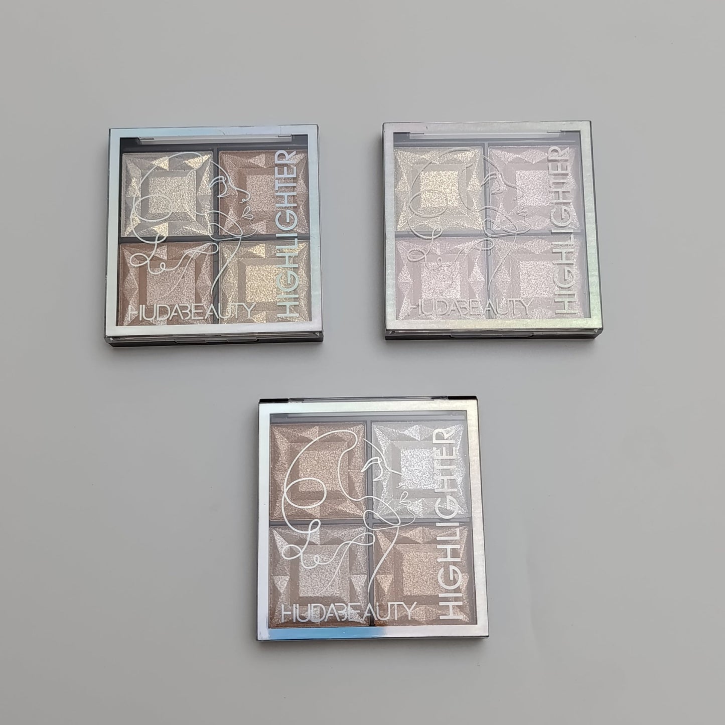 Huda Beauty Highlighter Palette – 4 in 1 Glow Kit ✨ Radiant & Long - Lasting Shine - Lotshop.pk