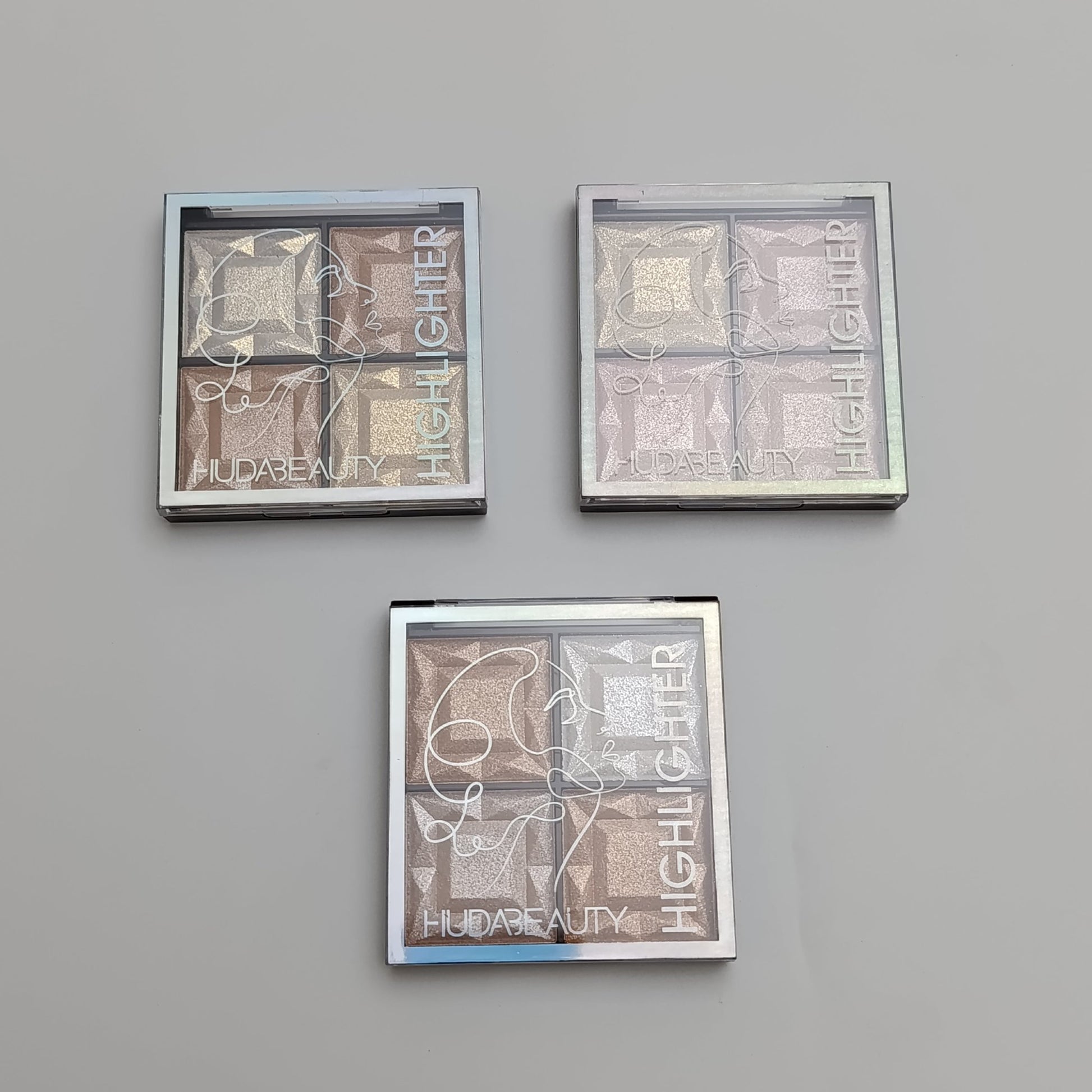 Huda Beauty Highlighter Palette – 4 in 1 Glow Kit ✨ Radiant & Long - Lasting Shine - Lotshop.pk