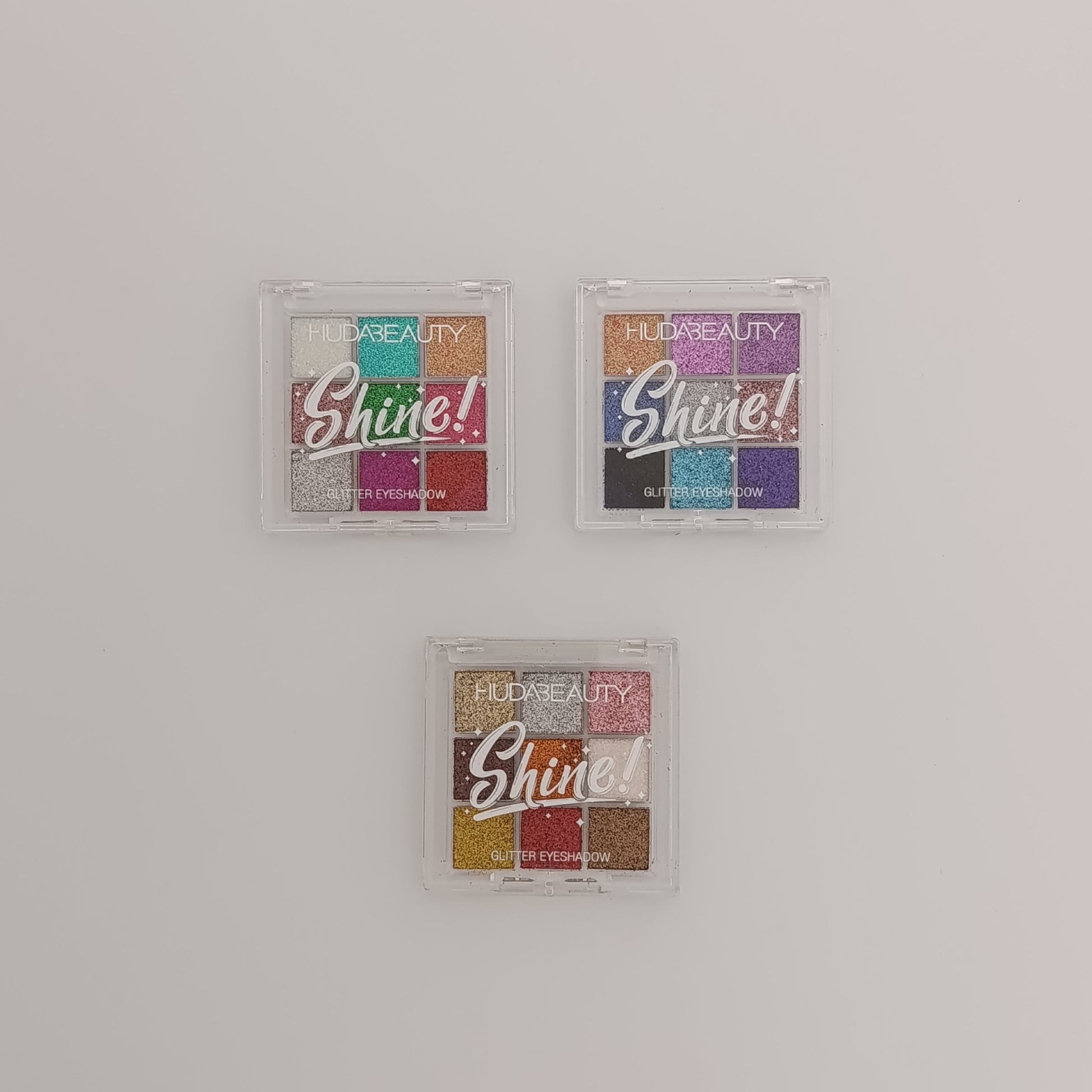 Huda Beauty Shine! 9 - Color Glitter Eyeshadow Palette – Ultra Pigmented, Long - Lasting & Sparkling Shades - Lotshop.pk
