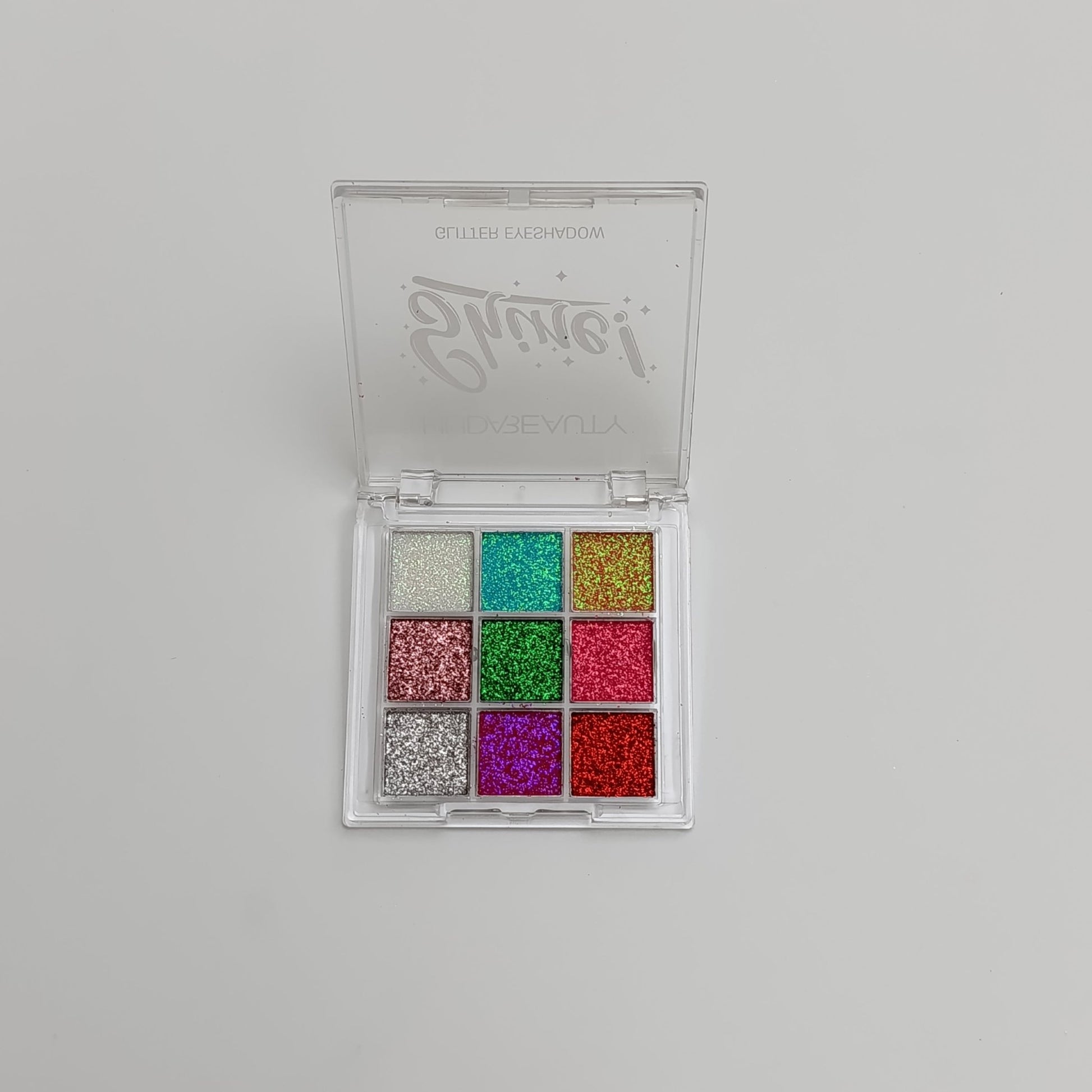 Huda Beauty Shine! 9 - Color Glitter Eyeshadow Palette – Ultra Pigmented, Long - Lasting & Sparkling Shades - Lotshop.pk