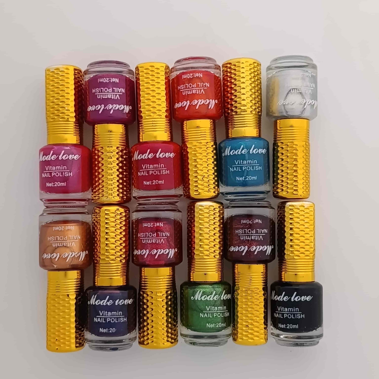Mode Love 12-Piece Vitamin Nail Polish Set 20ml multi-color shimmer and glossy nail paint collection price online in Pakistan
