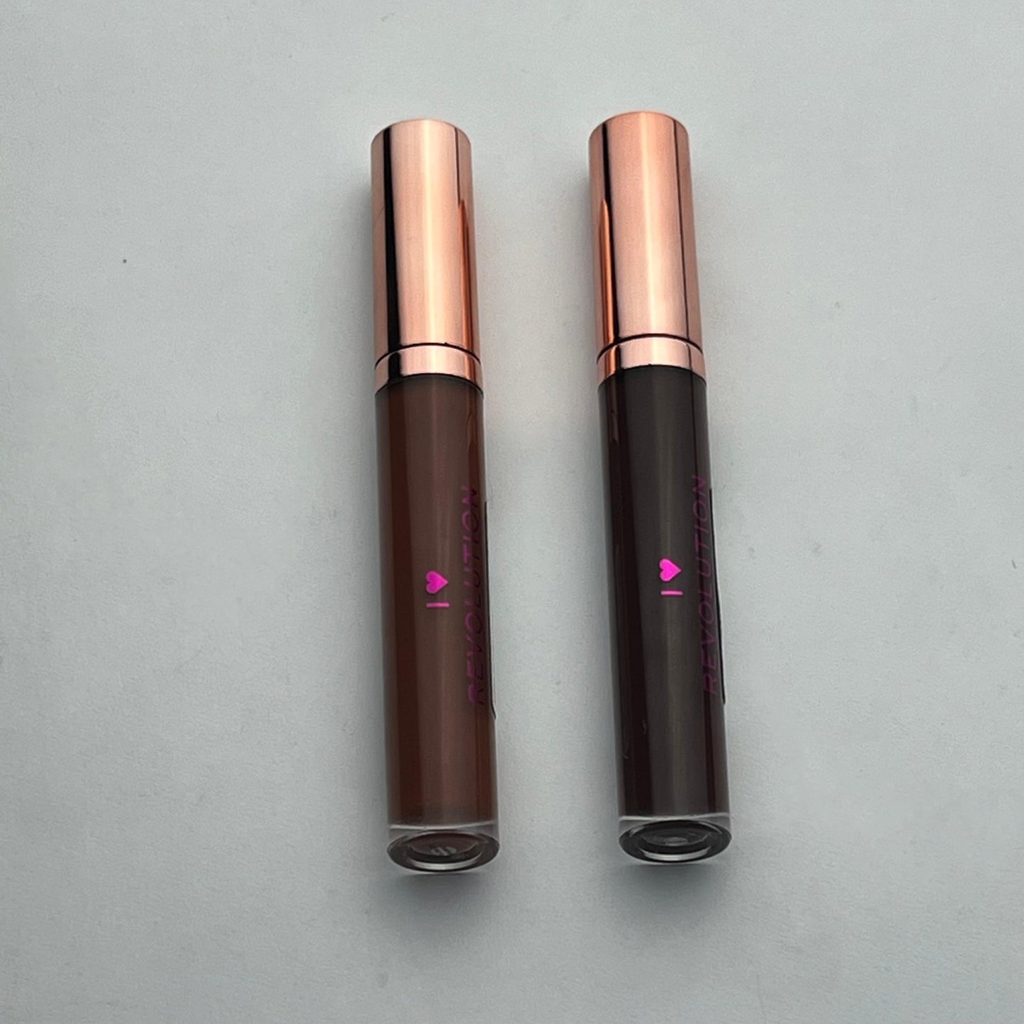 Pack of 2 Revolution Lip Glosses – Double the Shine, Double the Glamour - Lotshop.pk